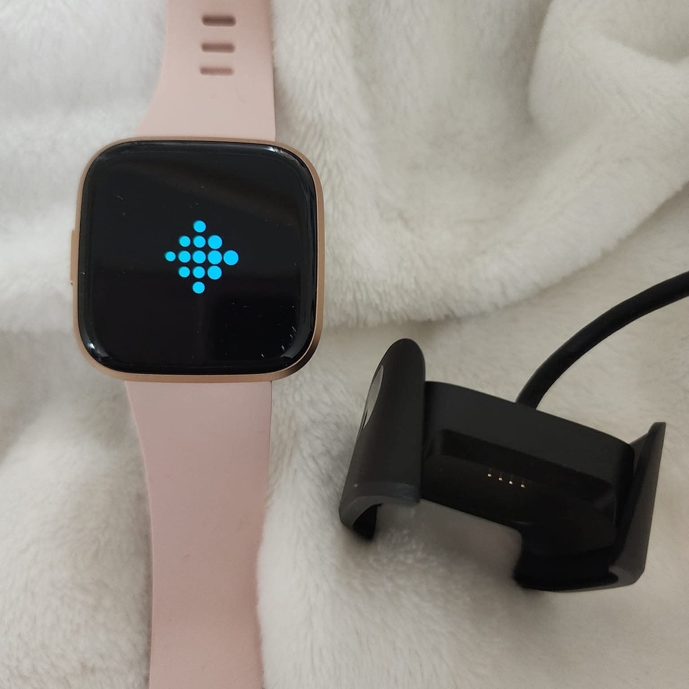 Fitbit Smartwatch in Pink with Charger